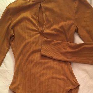 mustard yellow long-sleeve bodysuit